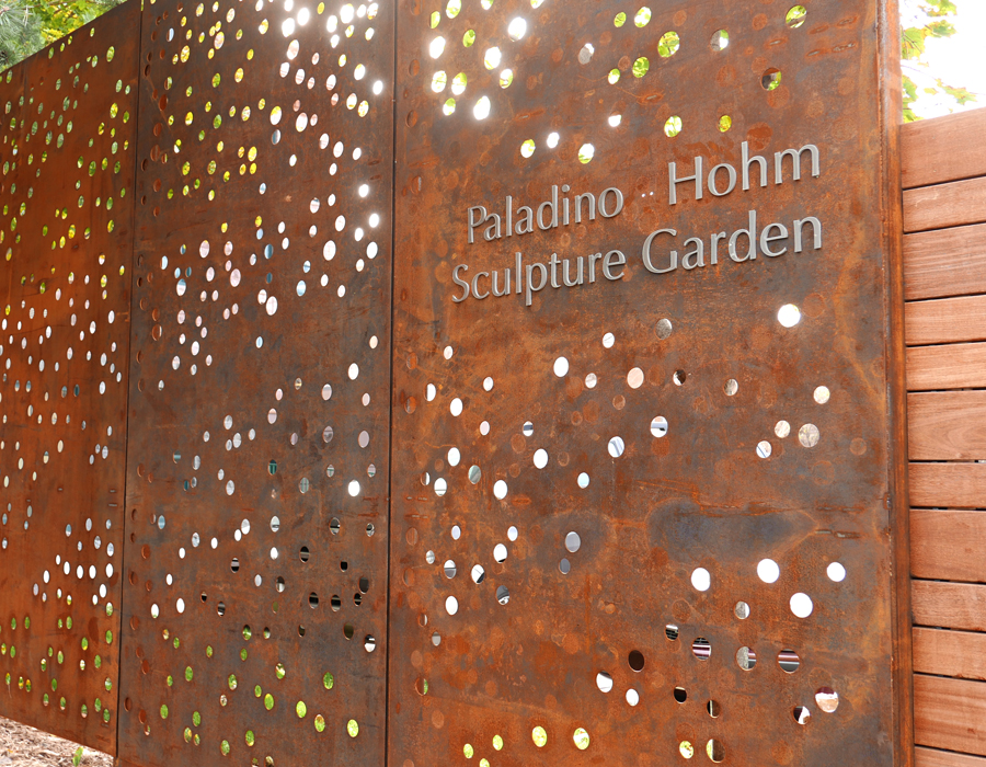 Back wall of the Paladino Hohm Sculpture Garden